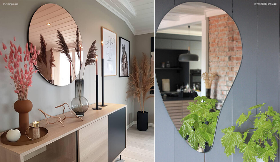 Στρογγυλός καθρέφτης σε ροζ χρυσό σε γκρι τοίχο - καθρέφτης σε σχήμα σταγόνας σε γκρι τοίχο